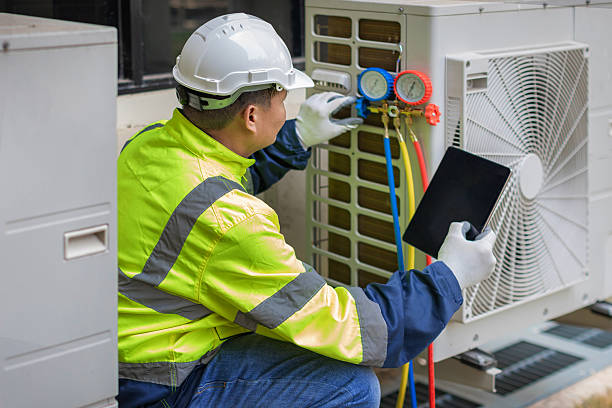Professional Heat Pump Repair technician working in Hubbard, OH